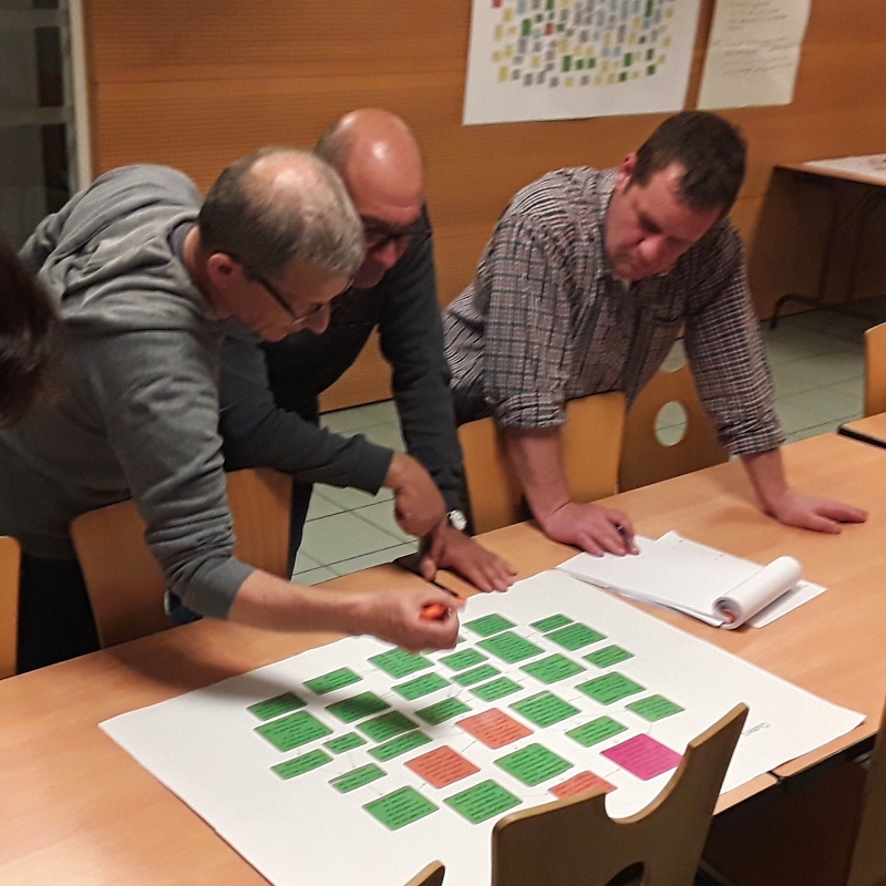 Garlic farmers in the Auvergne region of France work together in April 2019 to plan a cooperative marketing federation; photo by Amy Christian.
