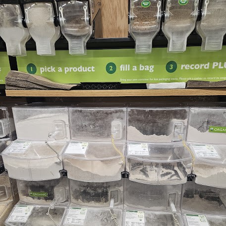 The Roanoke Co+op in Roanoke, Virginia, USA, offers self-service bins for customers to measure their preferred quantity of a variety of foods.
